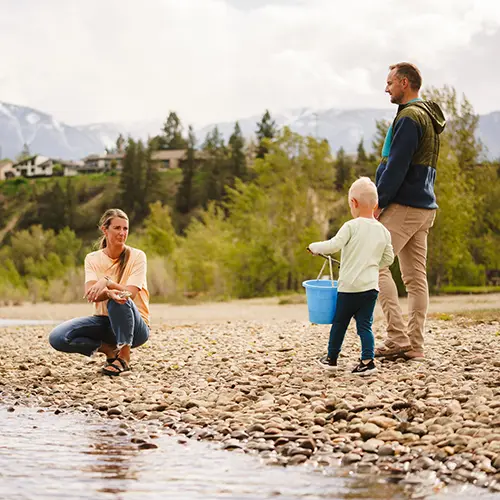 Family along the Columbia River in Radium Hot Springs, BC